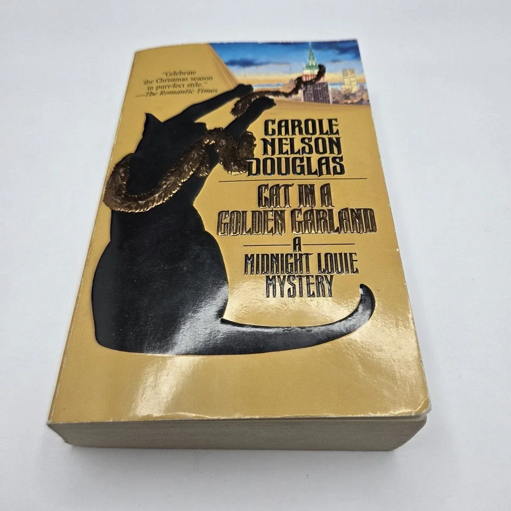 Cat in a Golden Garland by Carole Nelson Douglas Midnight Louie Mystery